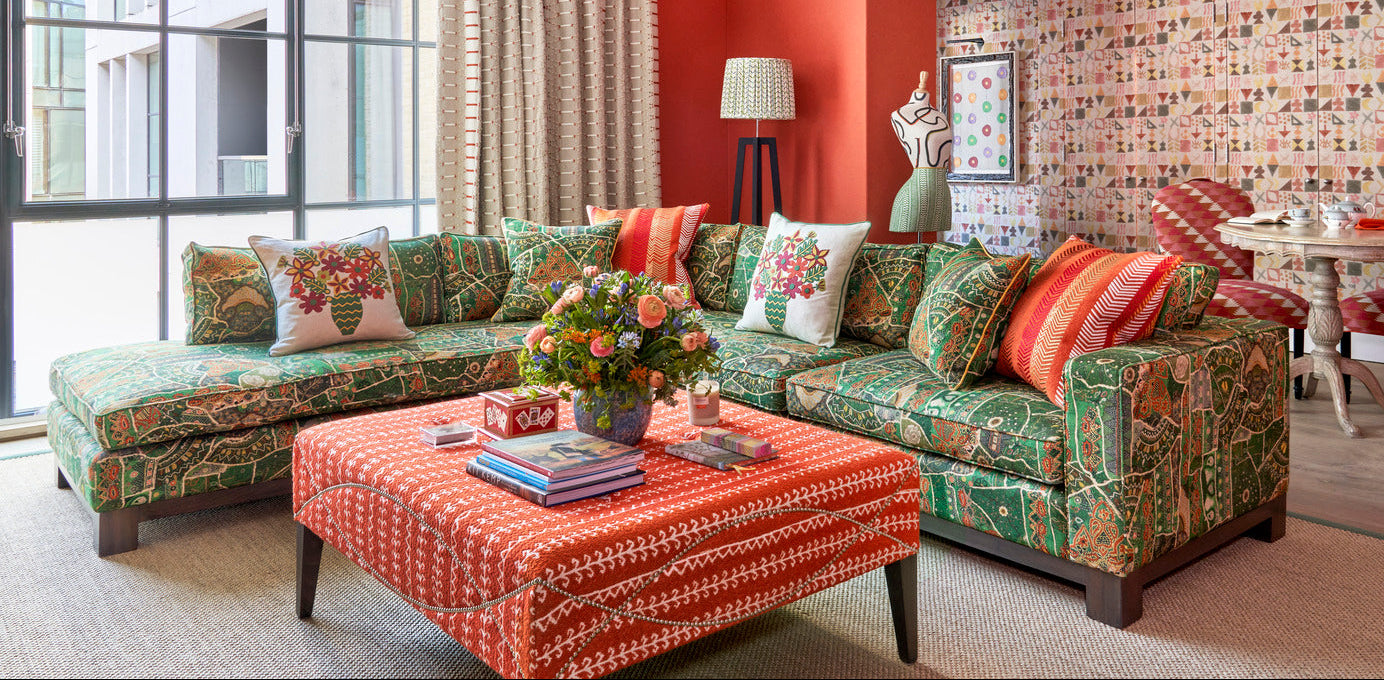 Infinitely expressive and boldly crafted, this Lottie bespoke sofa, designed by Kit Kemp, features a vibrant green and orange patterned fabric. With its generous size shape and comfortable cushions, the Lottie sofa can be customised and made to order.