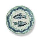 Sasha Compton handmade plate with two mackerel in centre surrounded by blue and green water, artist exclusive for Shop Kit Kemp