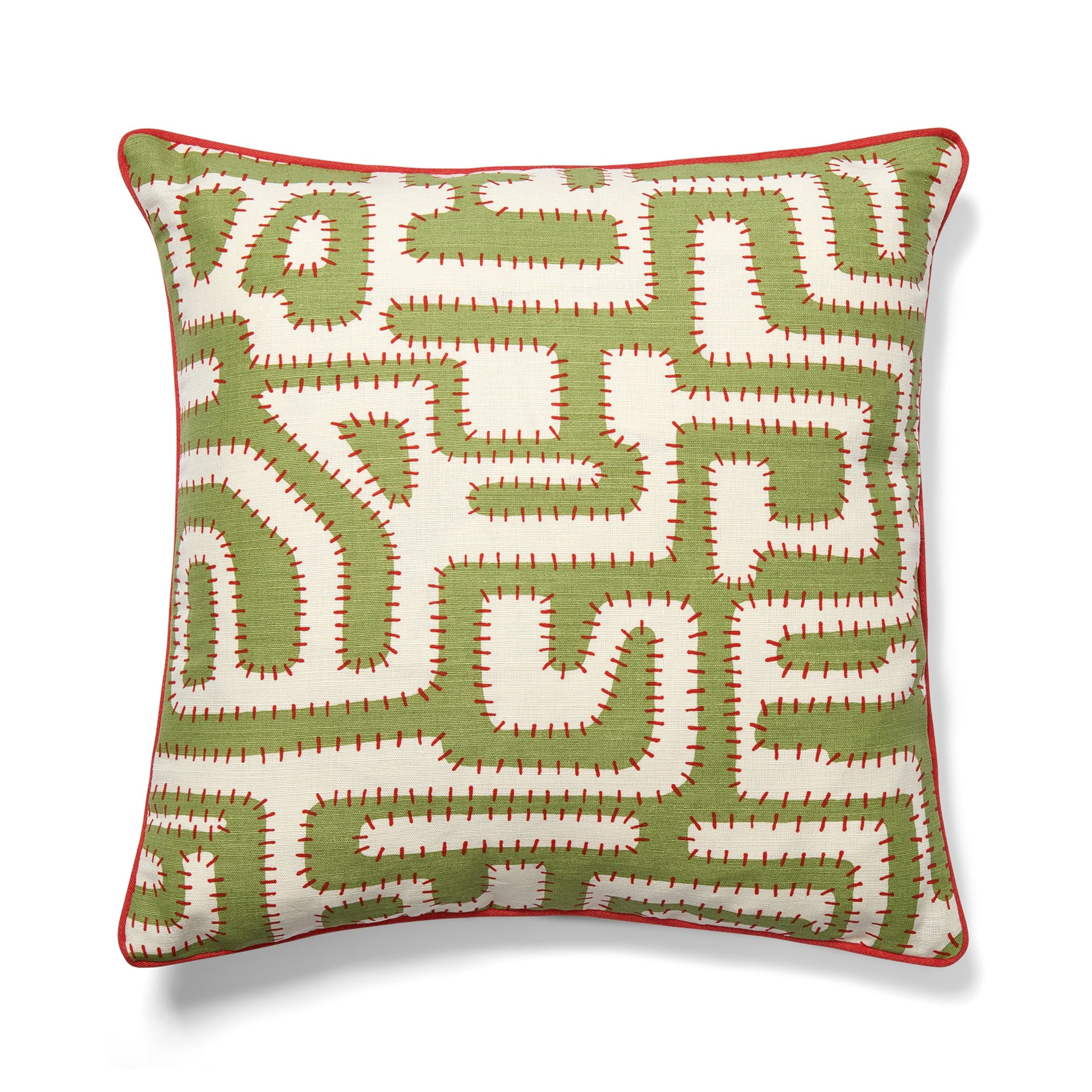Decorative pillow with green and white geometric pattern on a white background