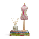 Decorative mini mannequin embroidered in the famous Kit Kemp Mikado fabric, featuring graphic pink and yellow stitching on a natural ground. A distinctive piece of artistry, made in England.