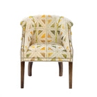 A Min Tub Chair upholstered in yellow and green fabric 