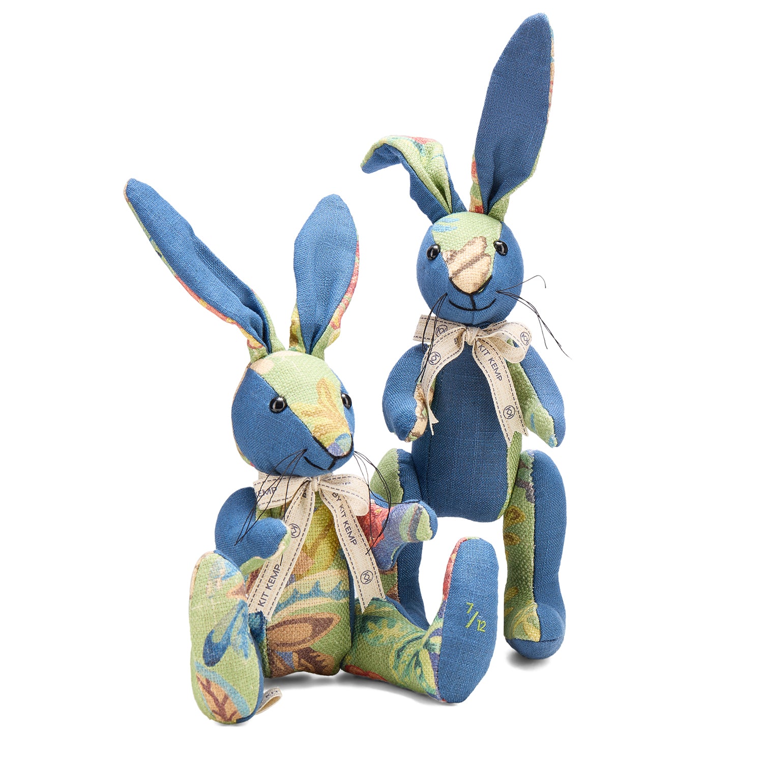 Bespoke Knight’s Tale Minnie Rabbits, meticulously handcrafted in the UK from repurposed designer offcuts. The rabbits feature the intricate Knight’s Tale fabric designed by Kit Kemp, characterized by its vibrant floral and foliage patterns in shades of sage and forest green.
