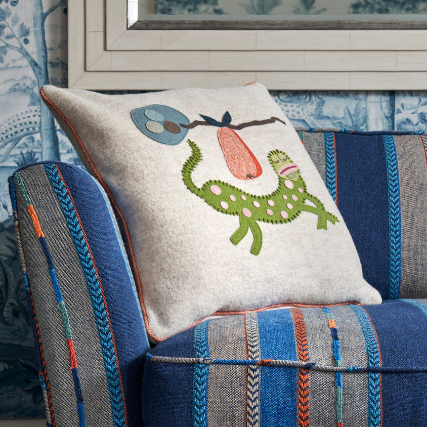 Mythical Gherkin Cushion combined with blue Bunty upholstered furniture, designed by Kit Kemp.