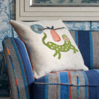 Mythical Gherkin Cushion combined with blue Bunty upholstered furniture, designed by Kit Kemp.