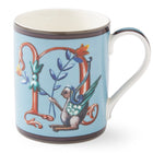 The gold N on this pale blue mug forms a decorative background to the mythical winged creature, with its blue and yellow corn-like floral posy.