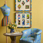 Shop The Look furniture and mannequin, Craig Table, and West Timber Tub Chair by Shop Kit Kemp, featuring distinctive Noah's Ark fabric in blue.