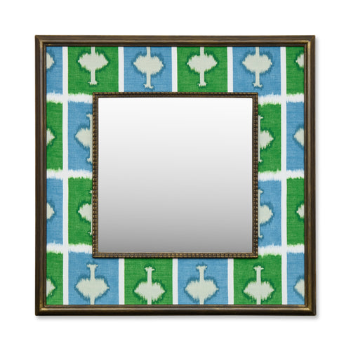 Kit's 'Ozone' checkerboard design with the contrast of the energising green against the vibrant blue, this wonderful decorative mirror ensures a bold pop of colour and joy with its wide fabric-covered border surrounding a square central mirror in a wooden frame. 