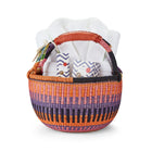 Gift basket for spa enthusiasts, includes a one size fits all towelling bathrobe piped in orange, along with Shop Kit Kemp's Lavender Eucalyptus candle and nourishing hand cream.