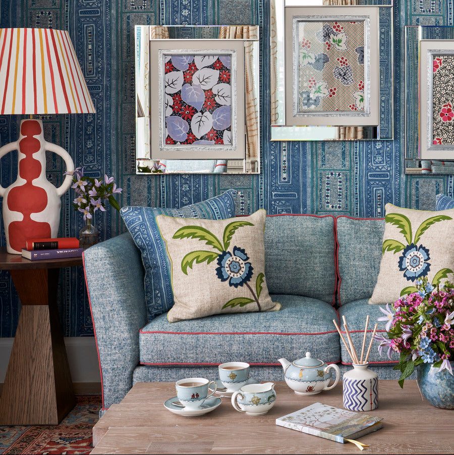 Perky Plant Cushion combined in blue theme Kit Kemp interior, featuring Sailor's Farewell fine bone china tea set, Lavender and Eucalyptus room scent diffuser, and High Tide Antique Table Lamp in earth tone. Featuring Lantern Parade notebook, and 3 Plank coffee table, exclusively at Shop Kit Kemp.