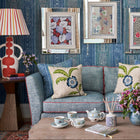 Perky Plant Cushion combined in blue theme Kit Kemp interior, featuring Sailor's Farewell fine bone china tea set, Lavender and Eucalyptus room scent diffuser, and High Tide Antique Table Lamp in earth tone. Featuring Lantern Parade notebook, and 3 Plank coffee table, exclusively at Shop Kit Kemp.