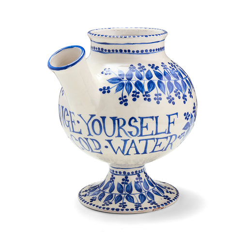 Syrup jar with blue floral patterns and 'Plunge Yourself Into Cold Water' text handpainted by artist Katrin Moye