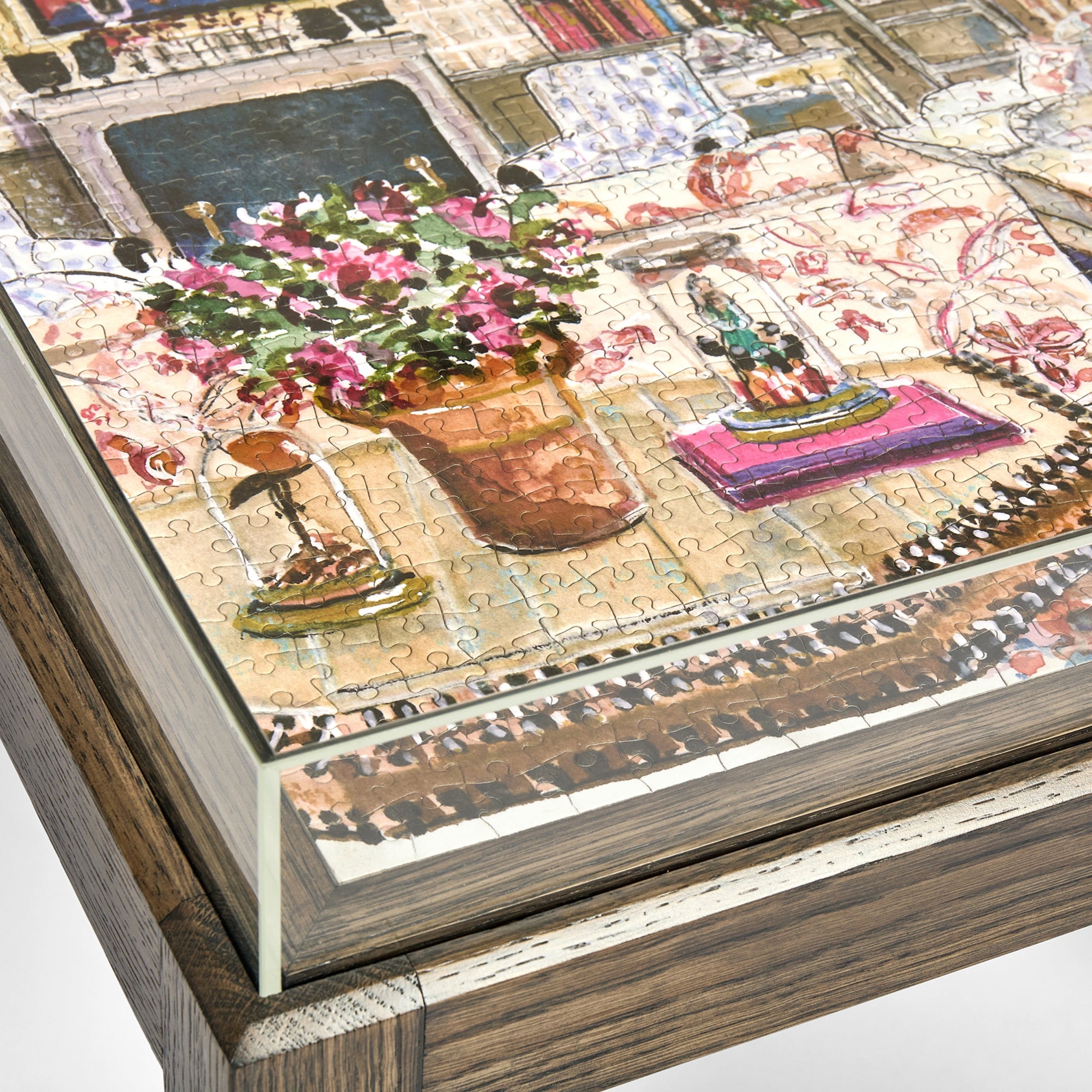 Jigsaw puzzle with a partially completed scene of a street market.