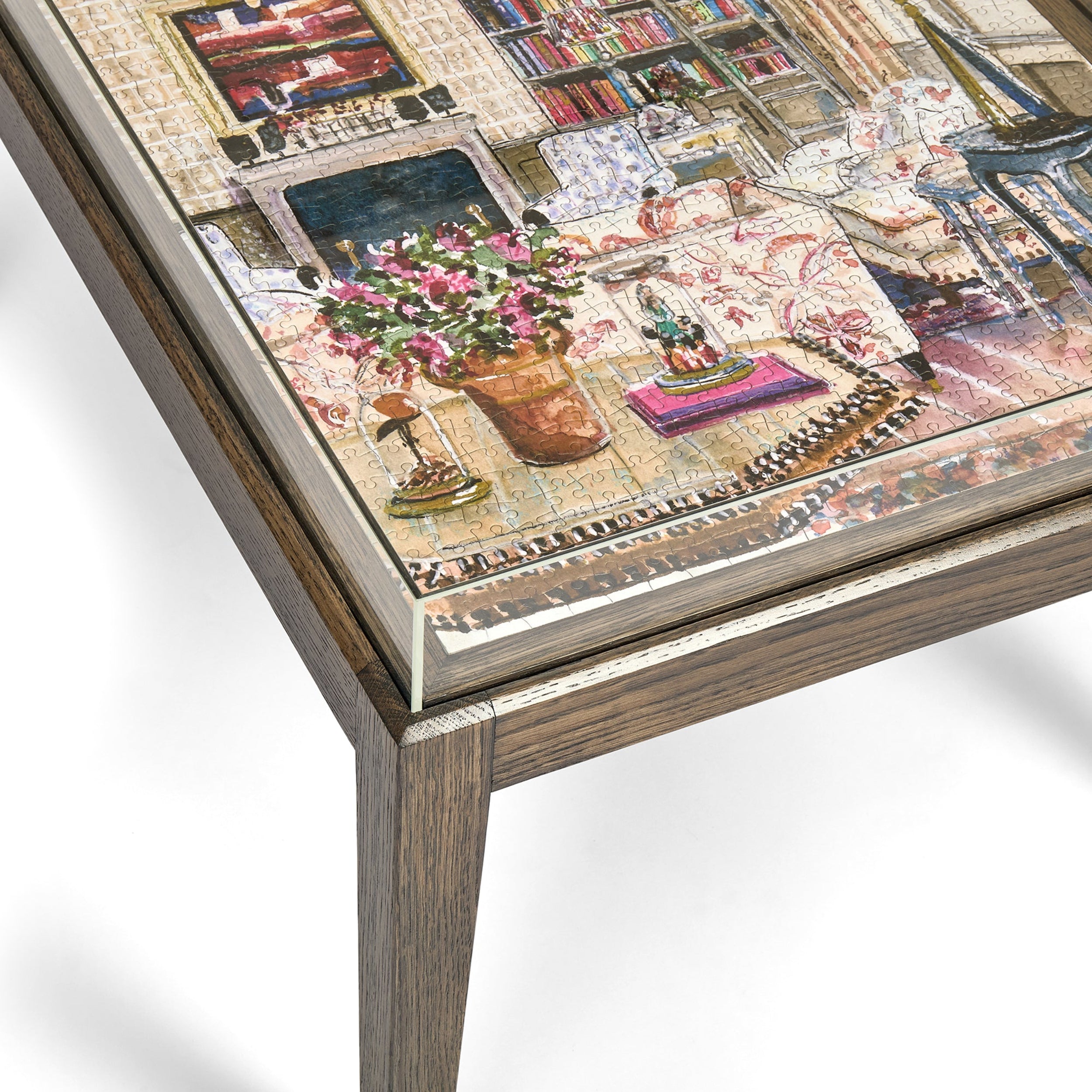 Framed puzzle with a detailed scene of a room filled with books and decorative items.