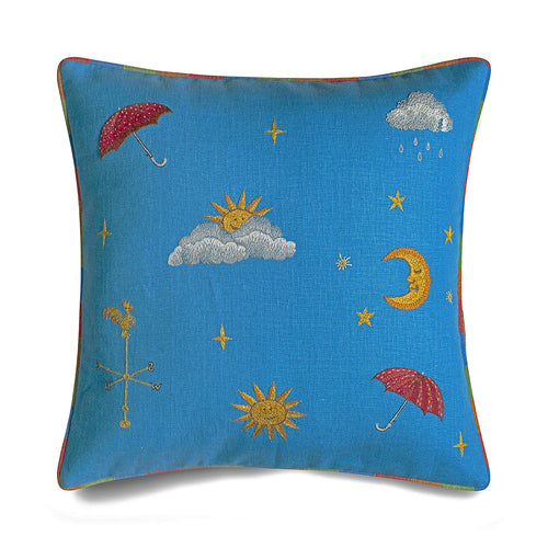 The Weekend collection cushion with embroidered sun, moon, clouds, and umbrellas. Exclusively at Shop Kit Kemp.