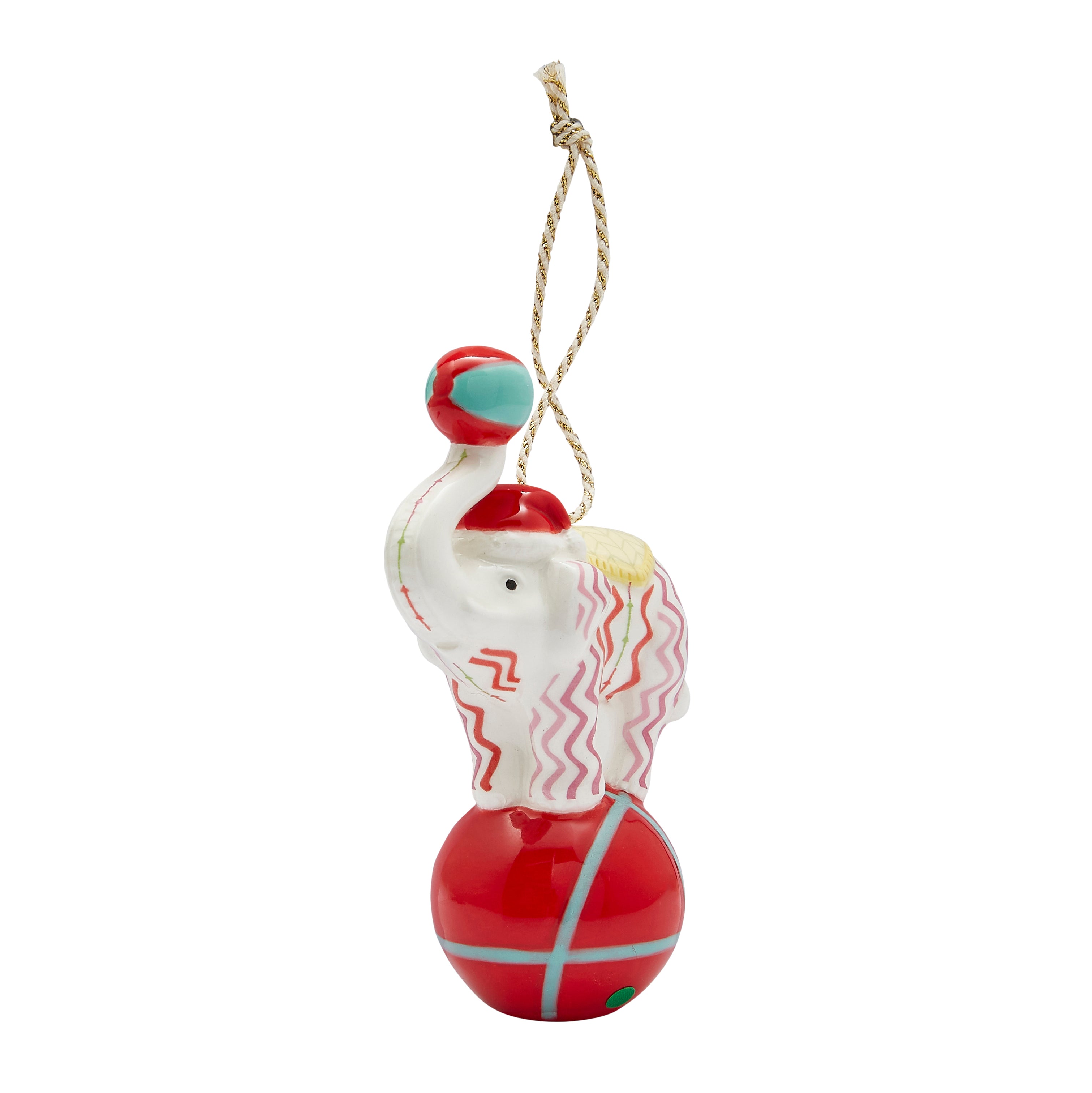 Kit Kemp for Spode fine china Rik Rak Elephant Ornament. This charming decoration features a circus elephant balancing on a red ball, decorated with the signature Rick Rack zigzag pattern. A unique and high-quality piece that is perfect for collectors and anyone seeking a whimsical, artistic touch for their Christmas tree.