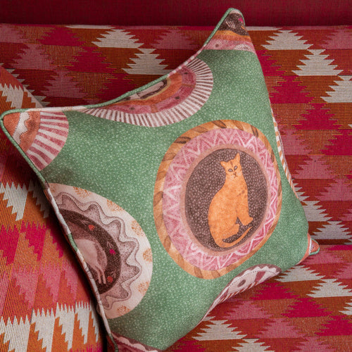 Robina's Dinner Party Green Cushion paired with Busy Lizzie fabric lined seating. Exclusively at Shop Kit Kemp.