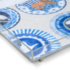 UK-made Kit Kemp acrylic tray showcasing the "Robina's Dinner Party" design in blue. Engineered in-house for a perfect balance of style and function, this versatile tray is both stackable and durable. A sustainable choice for a modern home, it brings an exclusive, playful touch to tabletop organization or ottoman styling.