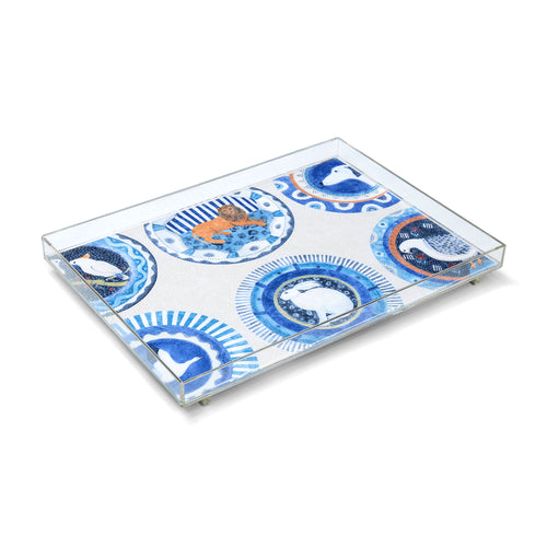 An exclusive Kit Kemp acrylic tray featuring the "Robina’s Dinner Party" illustration in vibrant blue. Designed for versatility, this practical and stackable piece serves as a stylish addition to a dining table or ottoman. Proudly made in the UK, it utilises high-quality materials to ensure durability while adding a playful, designer character to any interior setting.