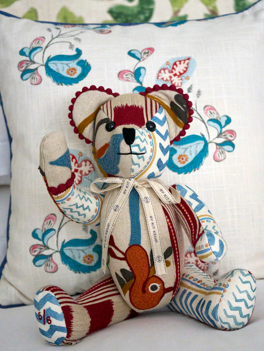 Ruby Bear Firmdale Anniversary Patchwork animal on Psycho Sprig Tropical Blue Cushion.