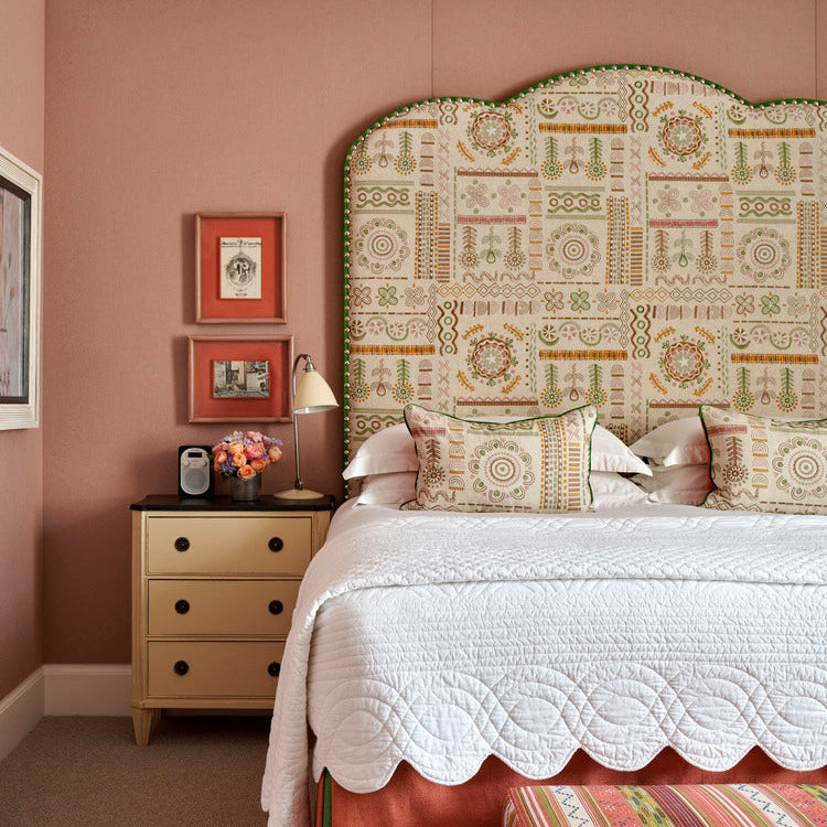 Haymarket Hotel bedroom with Ruby Headboard featuring Kit Kemp's Embroidery Fabric.