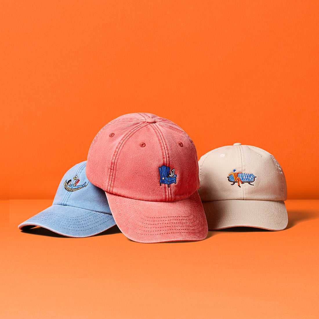 Shop Kit Kemp baseball caps in blue, pink, and beige, featuring Doodles embroidered designs.