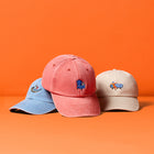 Shop Kit Kemp baseball caps in blue, pink, and beige, featuring Doodles embroidered designs.