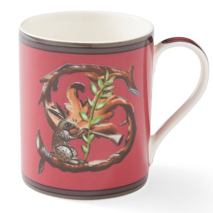 The S on this red mug forms an entwined branch , and a perfect point for our, trumpet carrying hare to herald the morning's news.