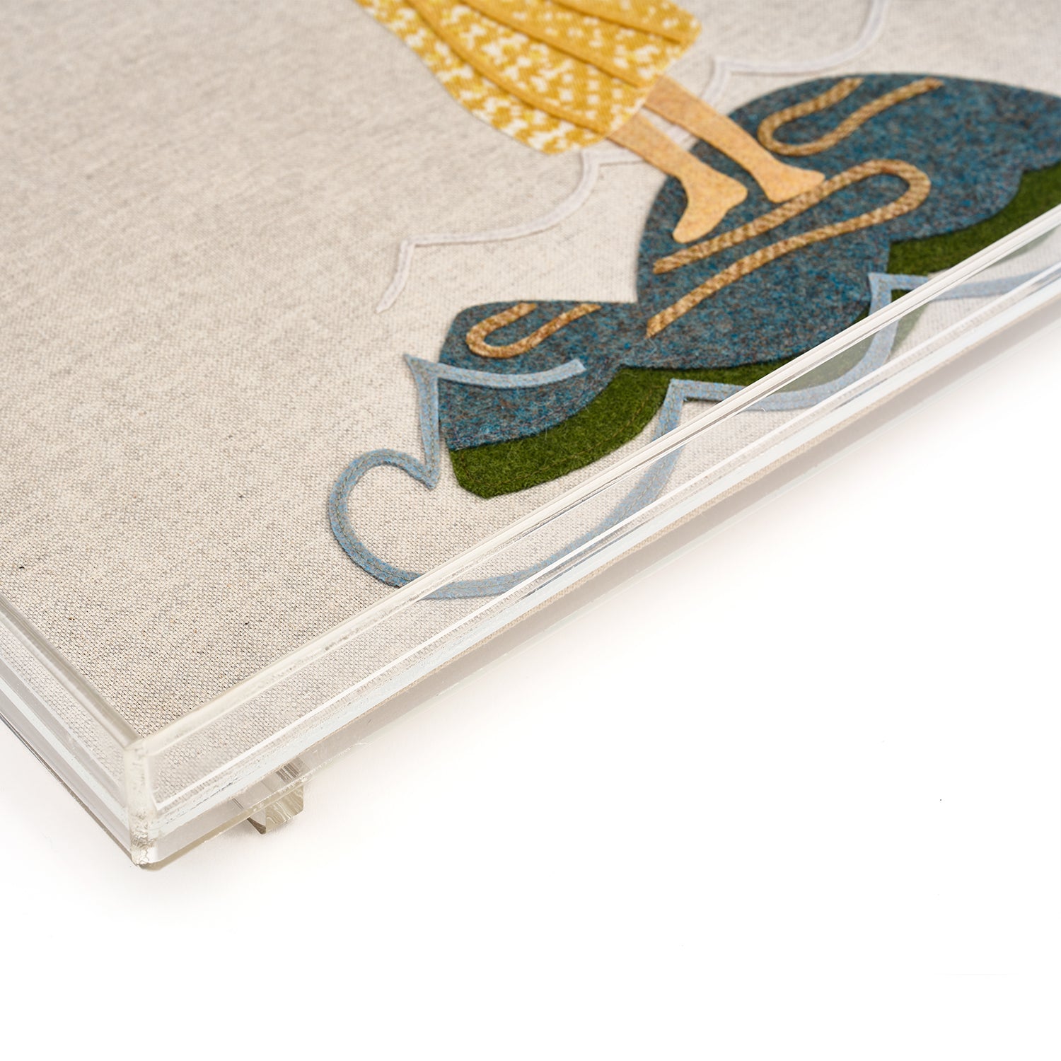This appliqué tray takes its inspiration from Kit Kemp's iconic Sailor's Farewell design, celebrating the spirit of discovery. A sailor's loved one is waving goodbye on a rock with her flag flying in the wind, hand-stitched on a horizon of oatmeal fabric.
