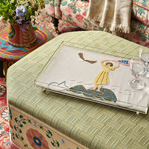 A limited-edition 250th USA Anniversary tray, handcrafted in England, featuring a maritime appliqué scene and a bald eagle on a textured oatmeal fabric base.