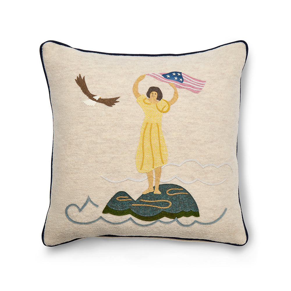 Front view of the 50cm x 50cm / 20 x 20 inches, Sailor's Farewell Edition 2 cushion, featuring woman with American flag and eagle, hand-stitched appliqué on 100% oatmeal Chamonix wool.