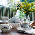 High tea set with Sailor's Farewell fine china tea cups and saucers, tea pot, milk jug, and plenty of design joy created by Kit Kemp.