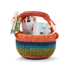 Sailor's Farewell Tea gift basket containing a Sailor's Farewell mug and a tea tin presented in a woven basket, secured with a ribbon, ready for gifting to any tea lover. 