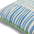 This sustainable piece features the iconic Saltaire linen print in Indigo and Lime. The artisanal, hand-printed aesthetic shows slightly irregular lines and a textured weave, highlighting its luxury British craftsmanship. Exclusively at Shop Kit Kemp.