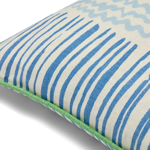 This sustainable piece features the iconic Saltaire linen print in Indigo and Lime. The artisanal, hand-printed aesthetic shows slightly irregular lines and a textured weave, highlighting its luxury British craftsmanship. Exclusively at Shop Kit Kemp.