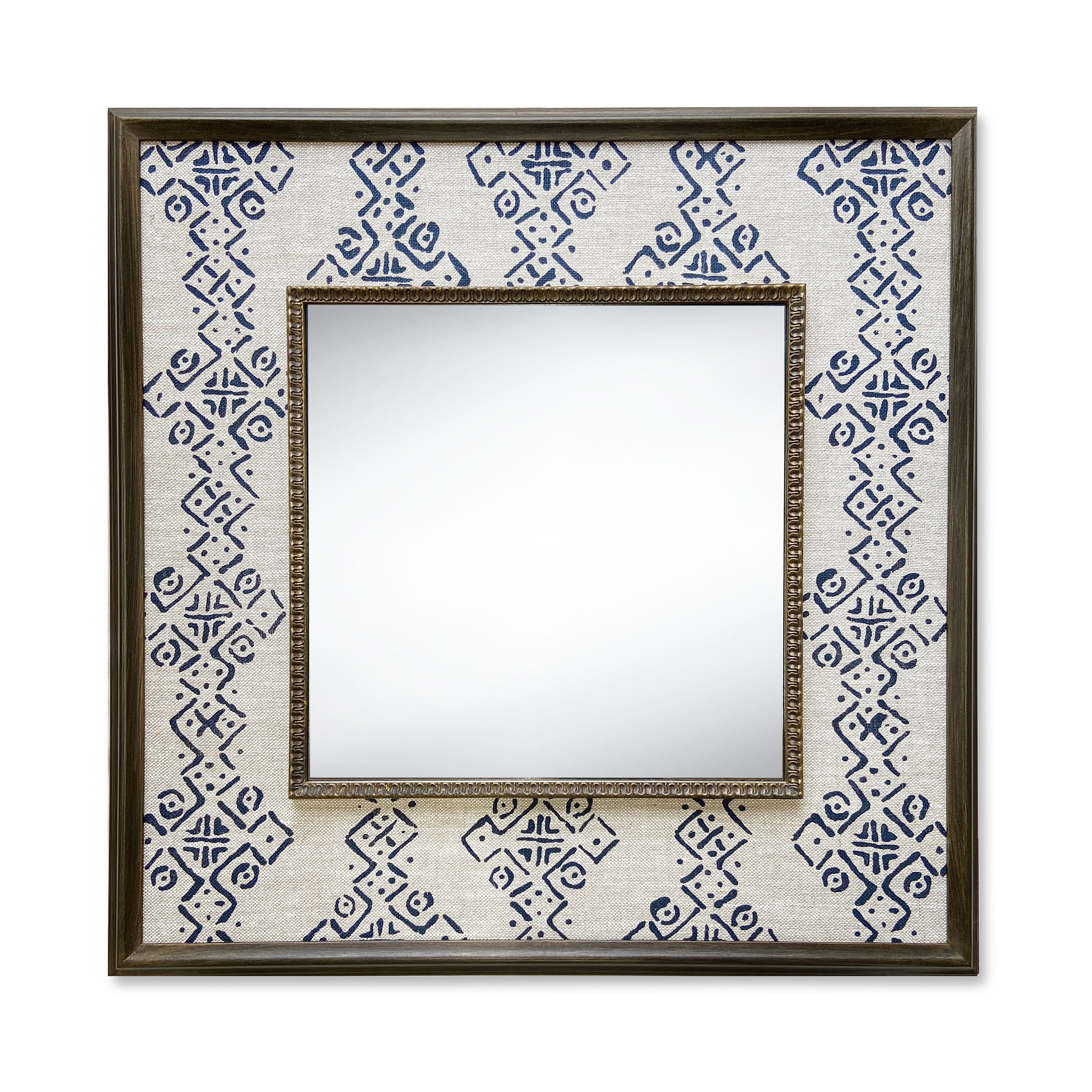 The Mali Mirror, features Kit Kemps Mali fabric designed for Blithfield, in natural linen, with a geometric indigo print, forming broad stripes simplified diamond, and crosses, stretched to form a wide decorative border around a square central mirror, in a wooden frame, and is a great statement mirror for any cloakroom, or hall.