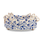 Oval vessel exterior, showing support feet and curved trim details, on Snake in a Garden artwork by Katrin Moye