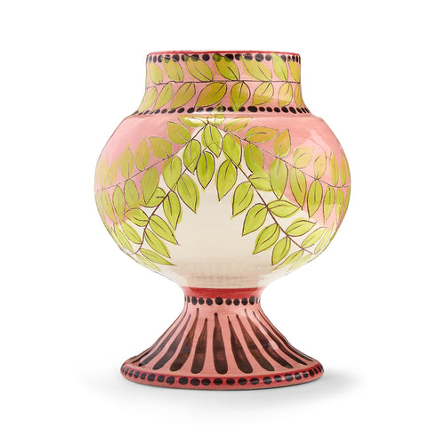 Pink and green pattern on vase with pedestal foot, shown without lid.