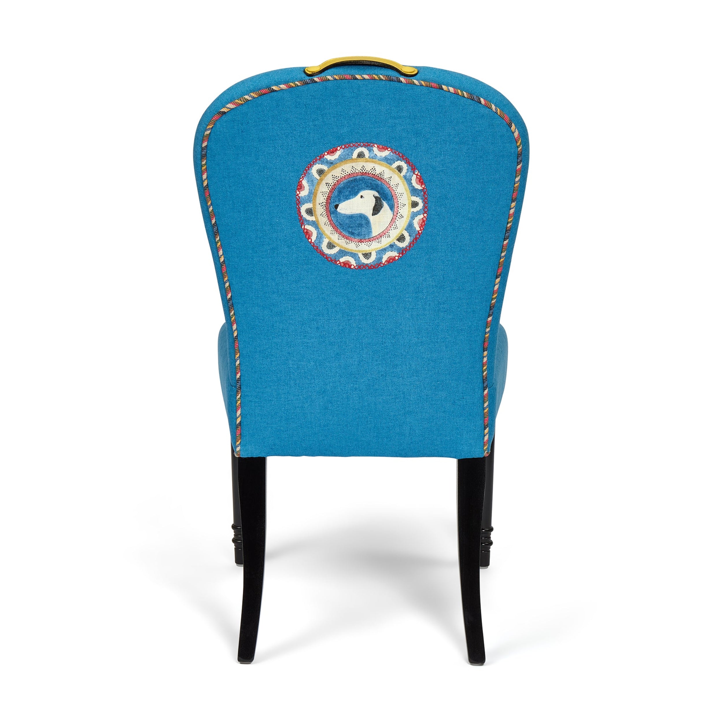 Blue chair with decorative backrest featuring a circular design on a white background
