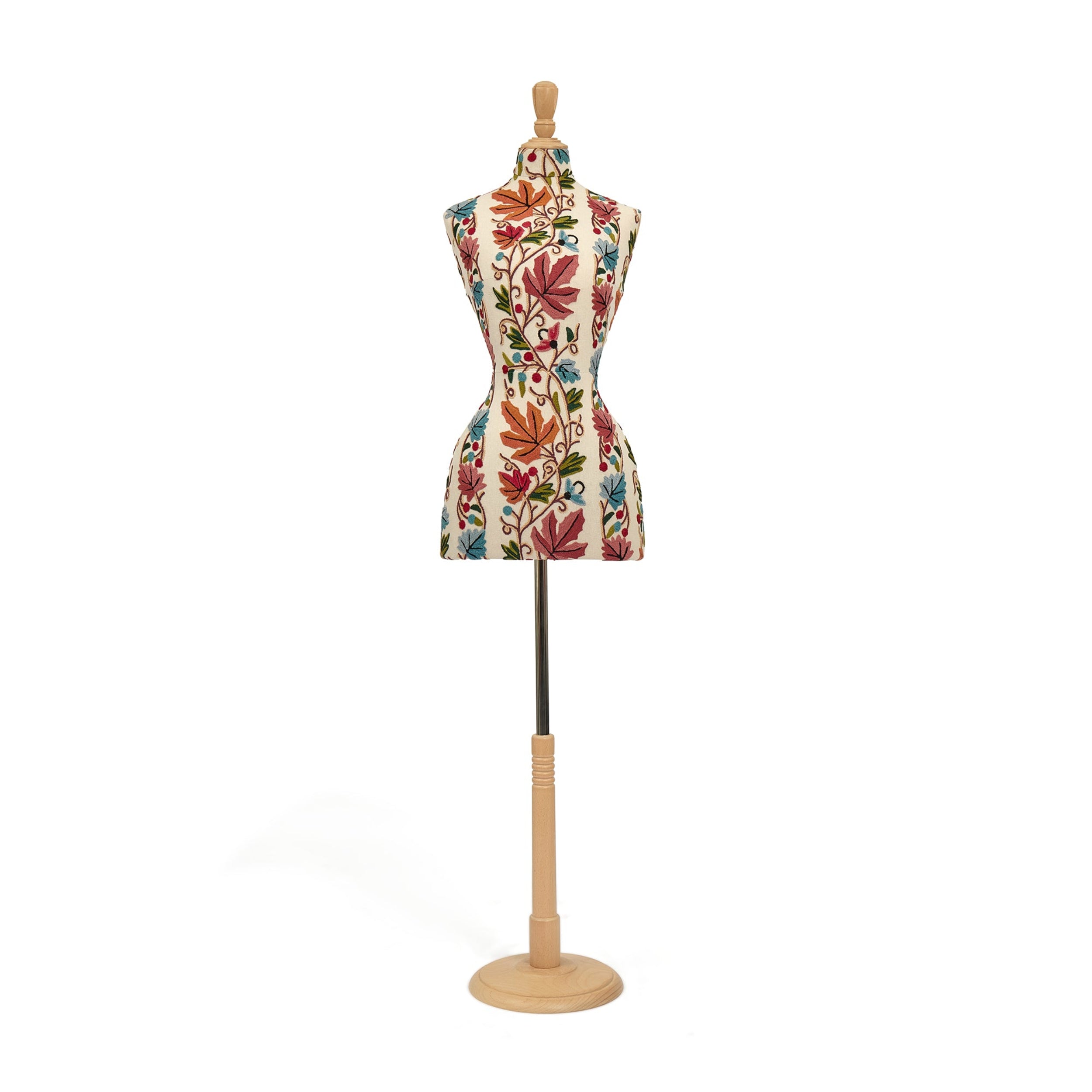 Mannequin dress form with floral pattern on a white background