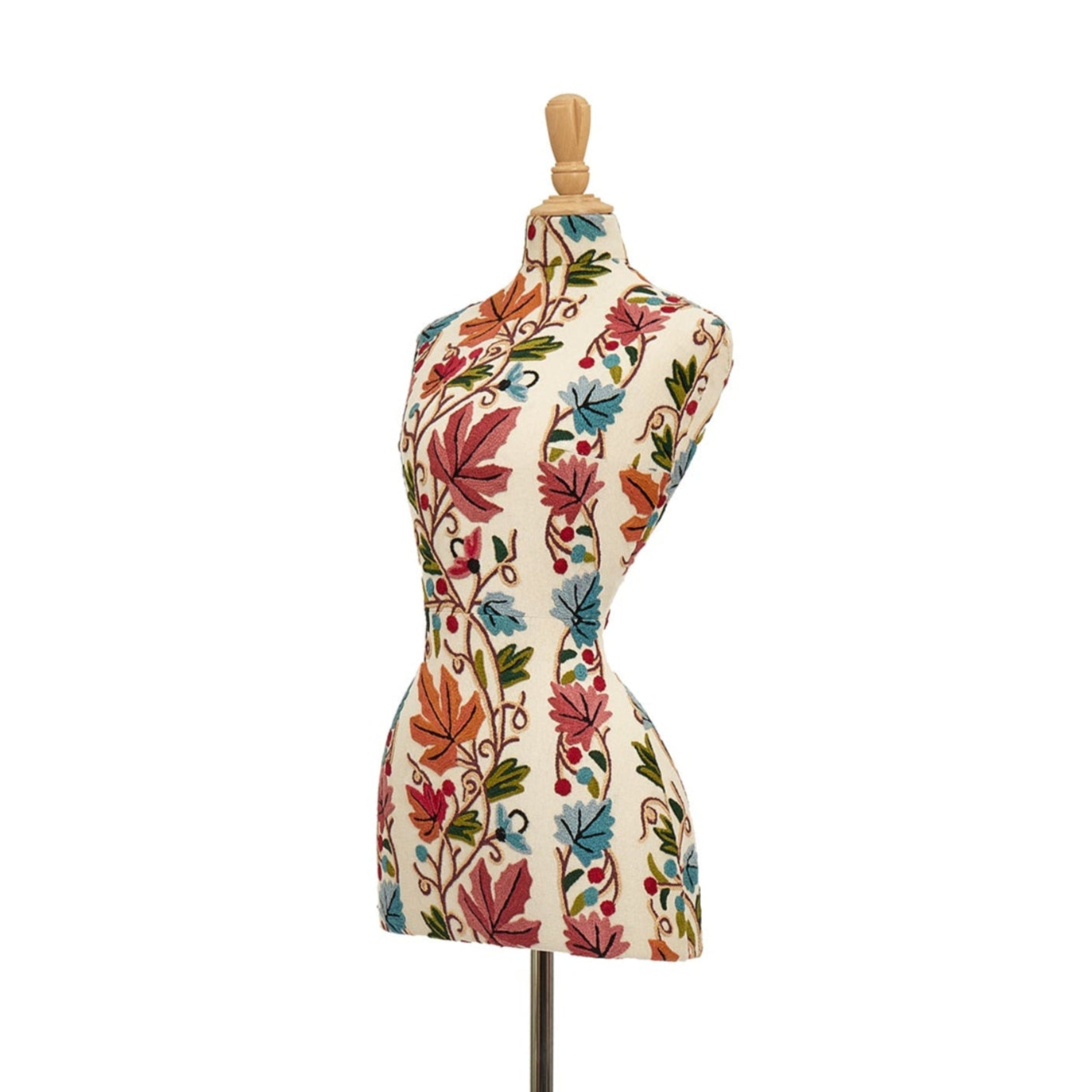 Mannequin torso with floral pattern on a white background