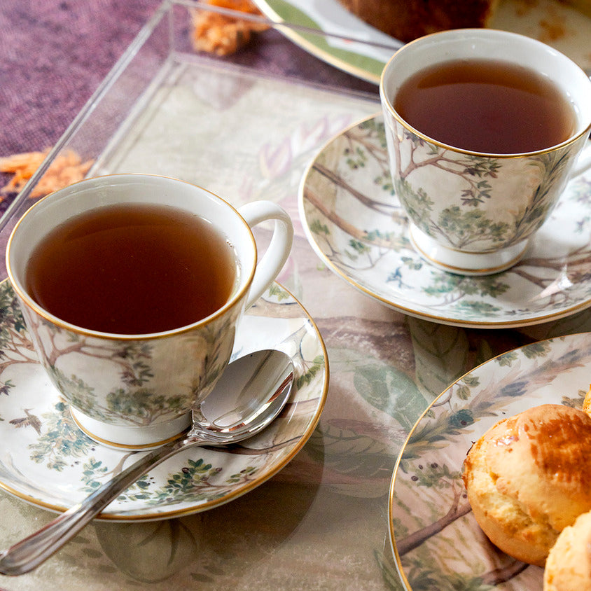 Timeless tea set for daily and special occasions with this fine bone china tea cups, saucers, and tea pot.
