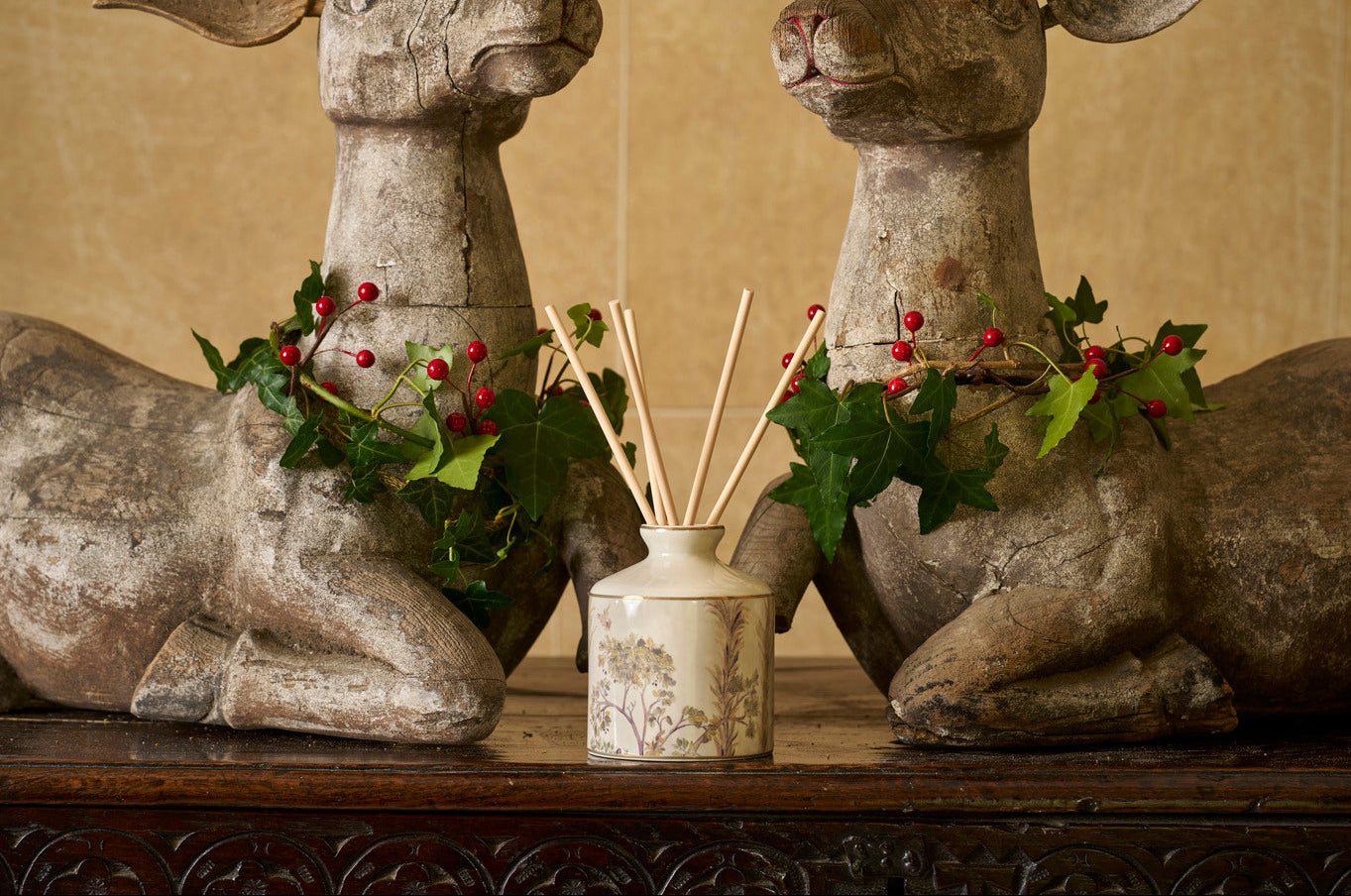 Shop Kit Kemp signature home fragrance with the delightful earthy tones of cedarwood and purple patchouli, creating a soothing aroma. This beautiful fragrance is housed in a re-usable ceramic jar printed with our iconic Tall Trees mural of an enchanted forest.