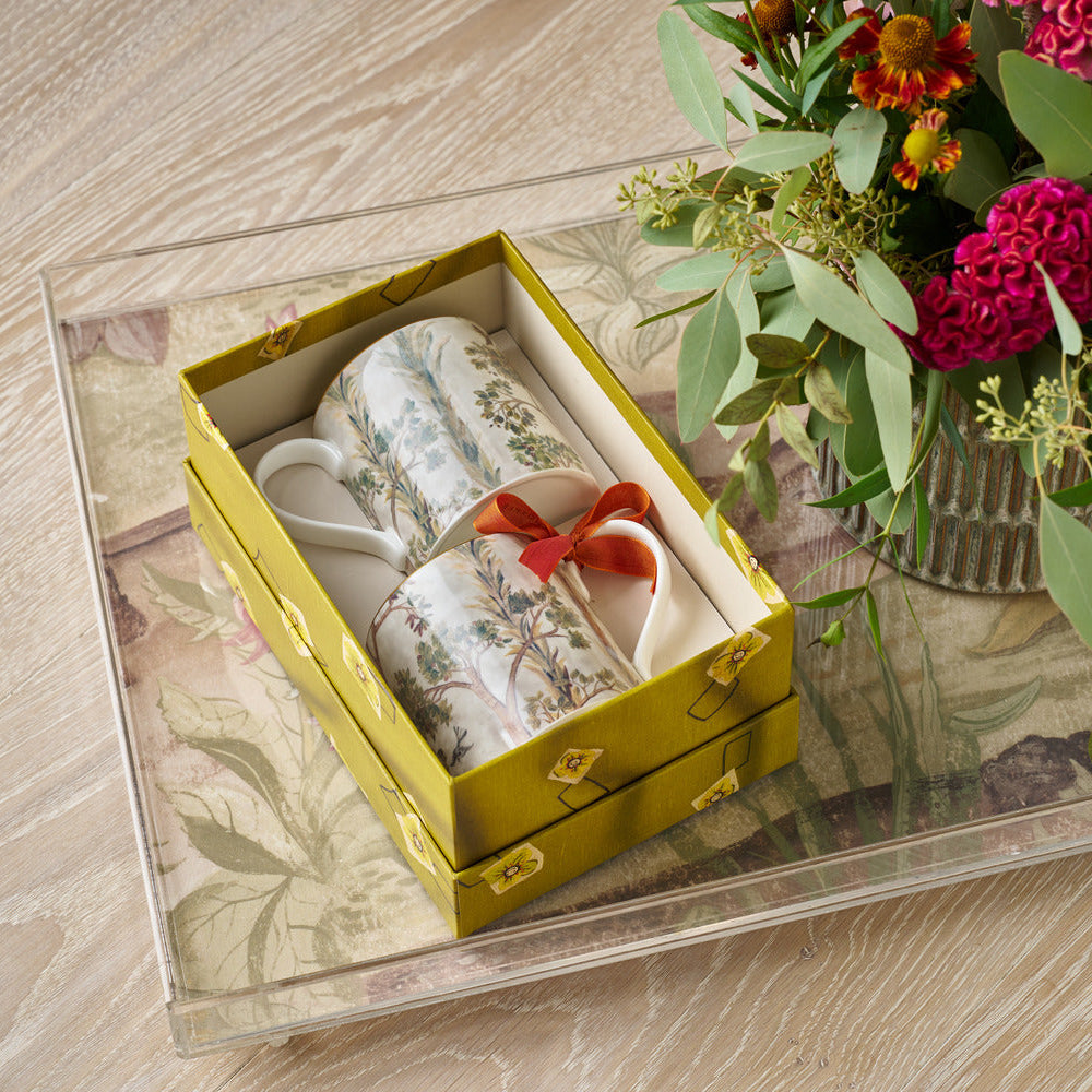 Stylish gift box with fine china set of two gold edged Tall Trees mugs, is a centre piece on any table display, and for daily tea and coffee pause.