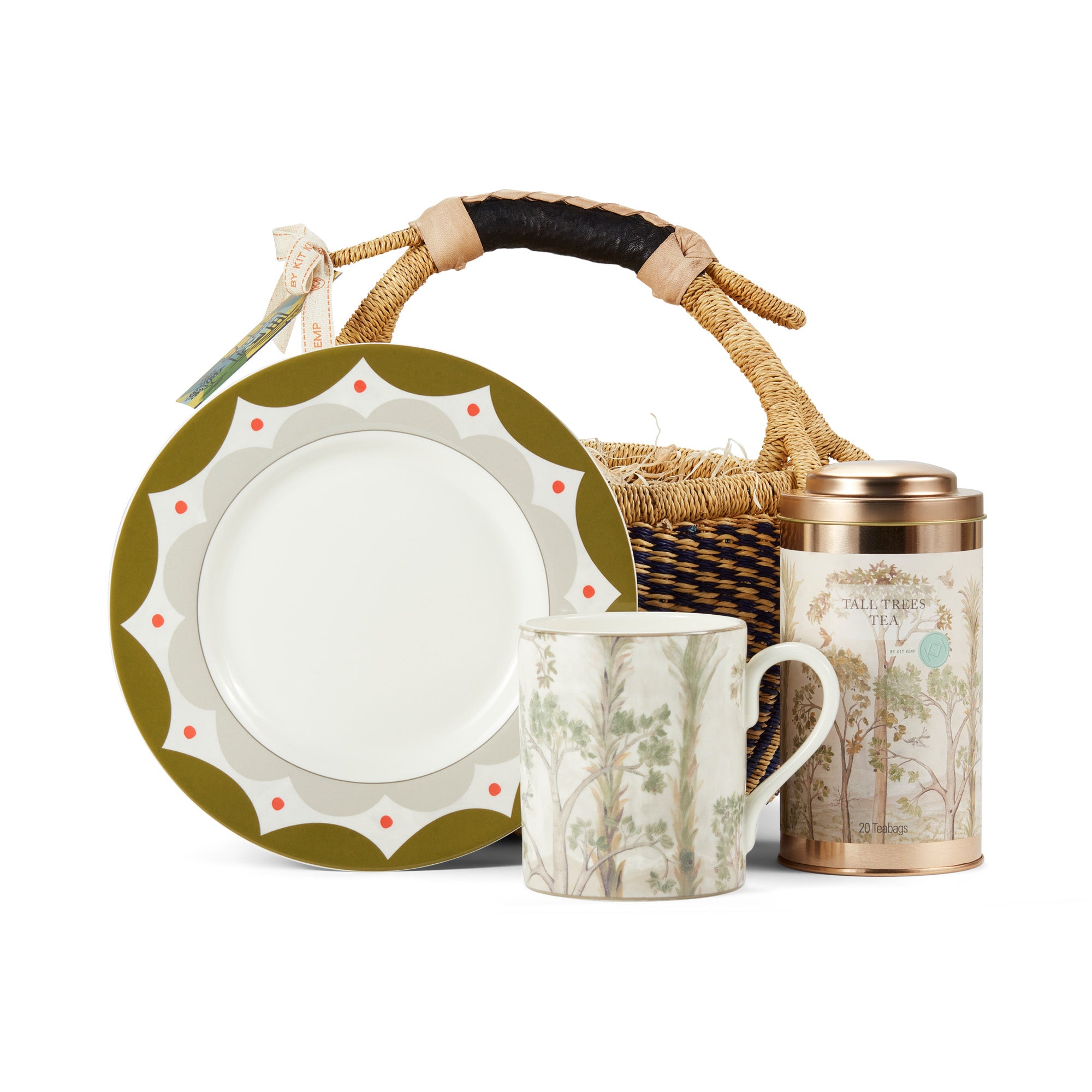 Tall Trees Tea gift basket containing a Tall Trees mug, Tall Trees mild black tea tin, and a Geo side plate, presented in a woven basket, secured with a ribbon, and ready for gifting to any tea lover. 