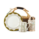 Tall Trees Tea gift basket containing a Tall Trees mug, Tall Trees mild black tea tin, and a Geo side plate, presented in a woven basket, secured with a ribbon, and ready for gifting to any tea lover. 