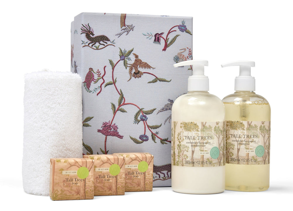Bath and body products with a decorative box on a white background