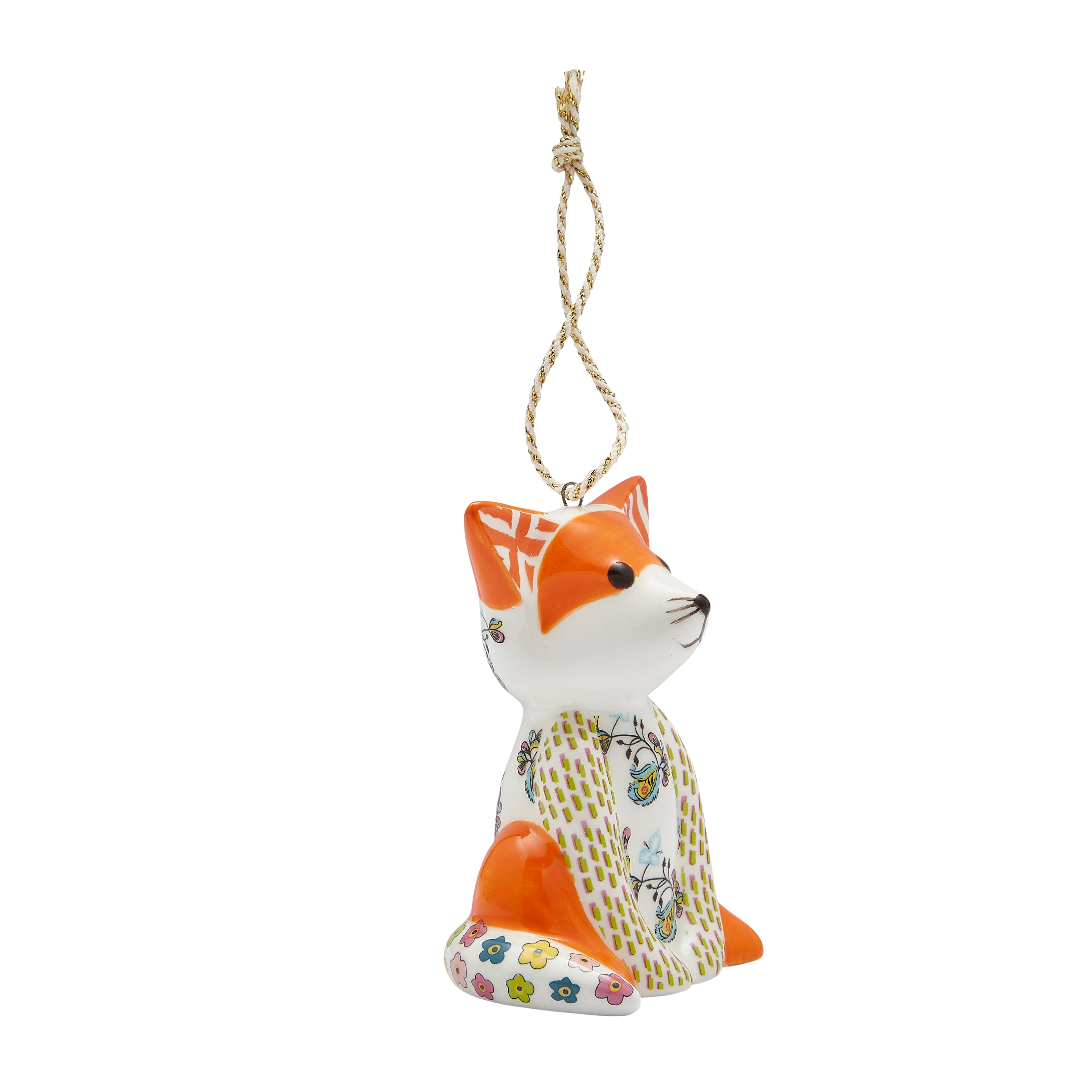 Kit Kemp for Spode fine china Fox Ornament. This Patchwork Animal decoration features a sitting fox with a bold, graphic pattern that includes elegant gold detailing. The body is adorned with a whimsical green and floral pattern. An eye-catching, unique ornament that makes a delightful gift.