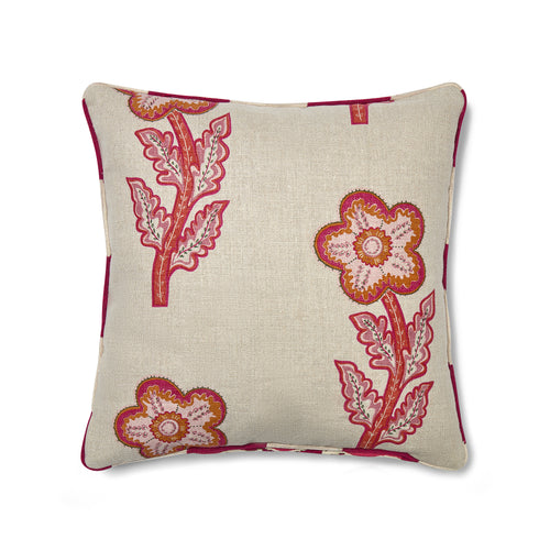 A decorative cushion featuring a creative patchwork of two signature Kit Kemp fabrics. The front displays "Tasha’s Trip," a vibrant 70s-inspired floral motif in pink and orange on a neutral linen base, while the sides and back showcase "Chubby Check," a bold raspberry and cream chequered pattern inspired by antique blankets. This piece reimagines "Flower Power" for modern interiors with a sophisticated, heritage-inspired twist.