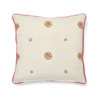 Kit Kemp Suzani design cushion for Chelsea Textiles, 41cm x 41cm (16in x 16in). Features hand-embroidered floral motifs in shades of red and pink on a cream linen-cotton background, elegantly finished with pink piping. Handcrafted in the UK using bespoke project offcuts for a sustainable, one-of-a-kind finish.