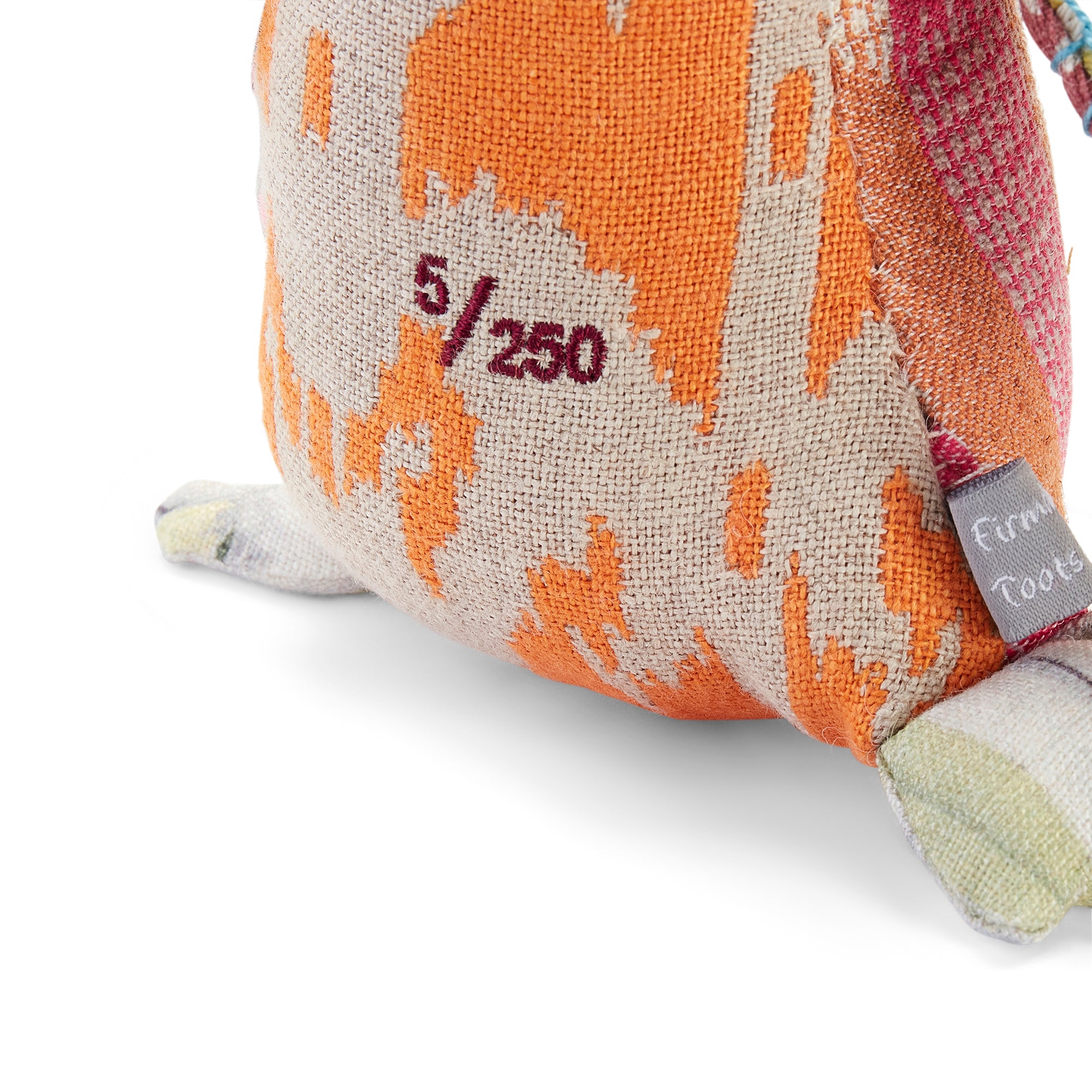 Sustainable patchwork owl accessory handmade in the UK using upcycled Kit Kemp design textiles, featuring vibrant fabric patterns and hand-stitched details. Each comes with a unique limited-edition number, making it an ideal collectable gift.